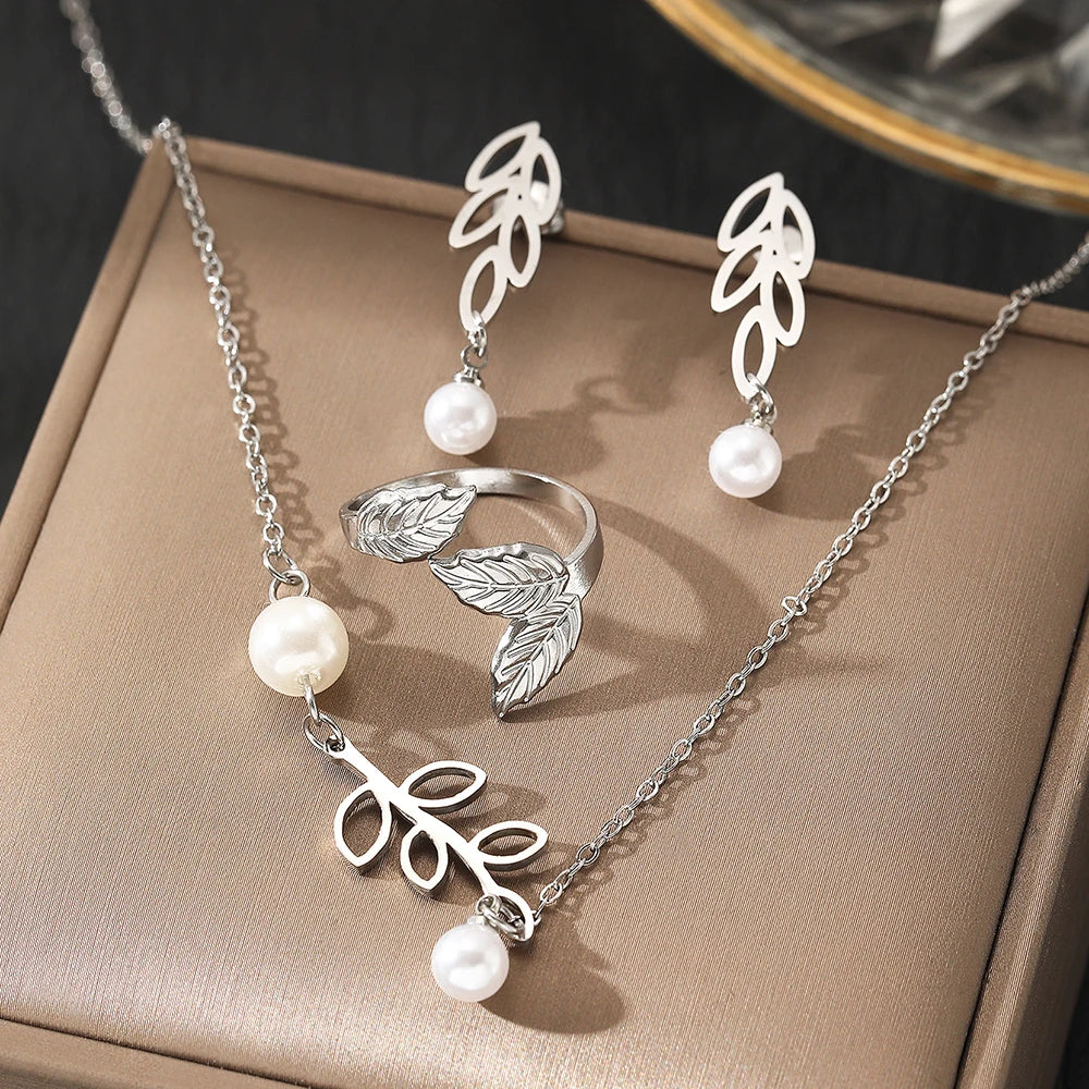 Stainless steel jewelry set featuring leaf pearl earrings, pearl necklace, and adjustable leaf ring for women, new style by Showlu Fashion