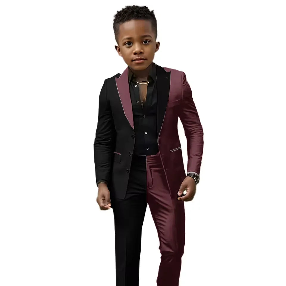 Boys black and white spliced wedding suit with jacket and pants, slim fit tuxedo for ages 2T-16T, suitable for special occasions.