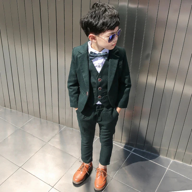 Dark green boys' formal wedding suit and tuxedo set with jacket, pants, vest, and bow tie from SHOWLU FASHION STORE