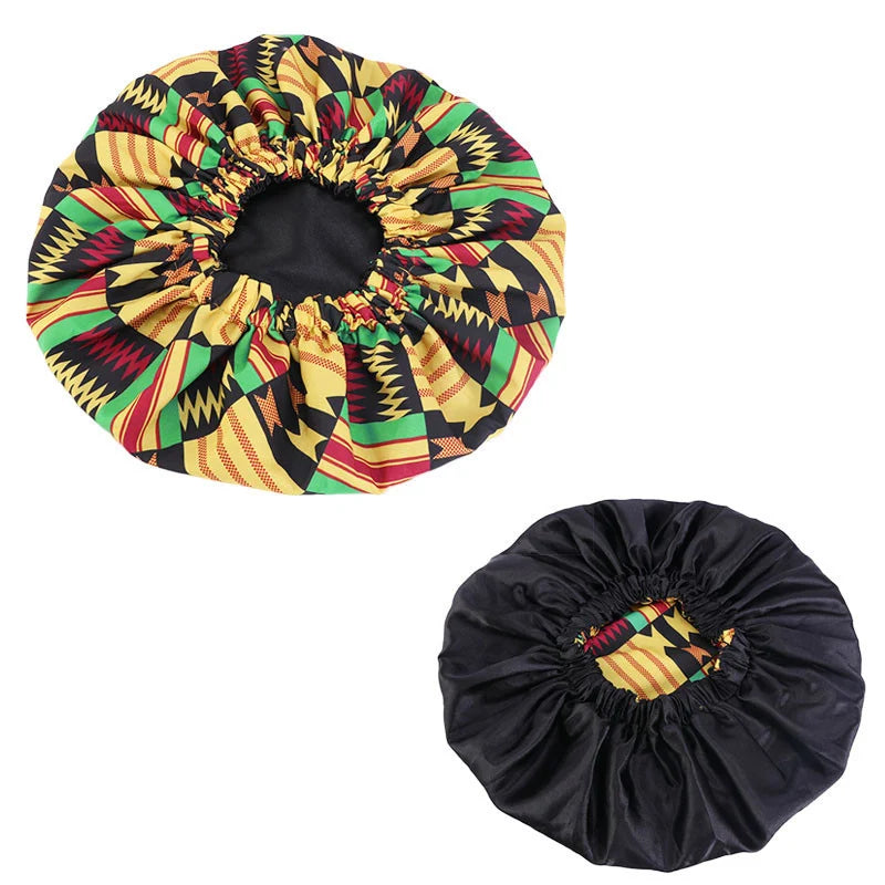 Women’s African Ankara print sleep cap with satin lining, soft large headwrap for hair care and comfortable night wear.