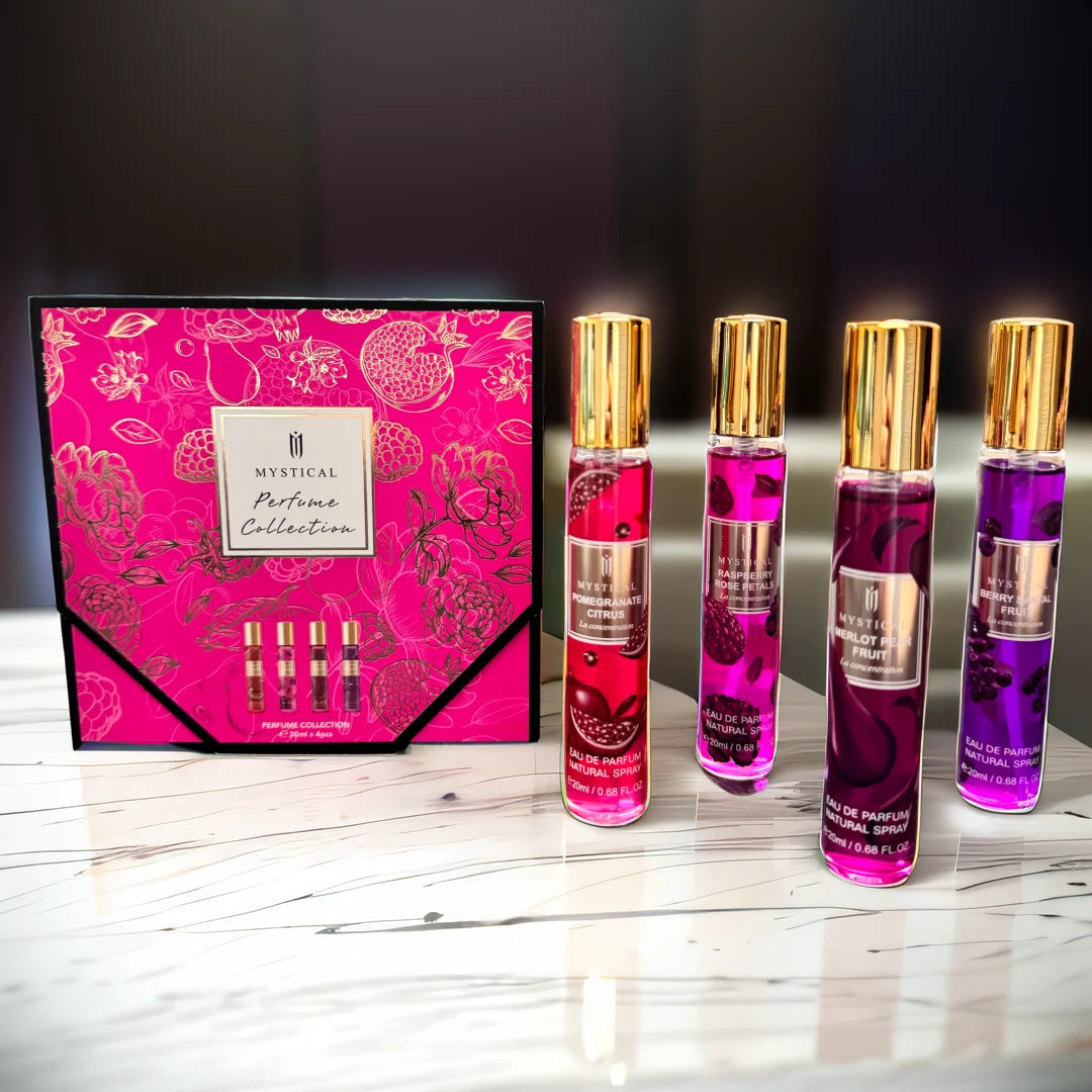 Showlu Fashion Mystical Fruity Fragrance perfume gift set with four travel-sized bottles, vibrant packaging, and fruity scent details.