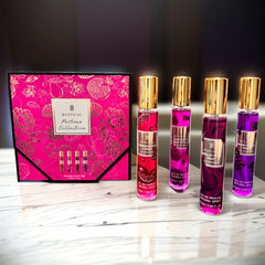 A Mystical perfume gift set featuring four 20ml fruity fragrance sprays in a pink floral box.