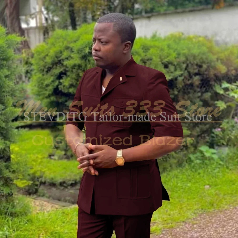 Safari men's short sleeve suit set with single-breasted jacket and pants, featuring stand notch lapel, African fashion style.