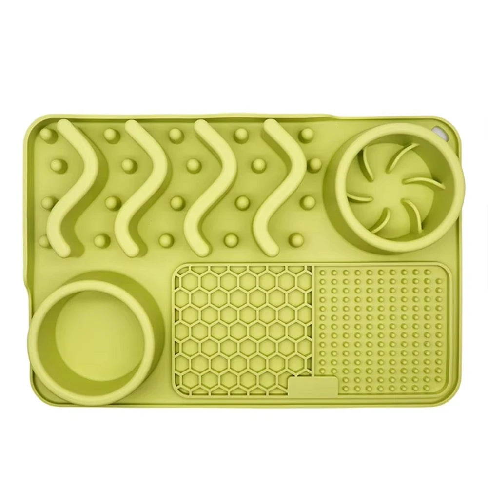 Showlu Fashion Store pet slow feeder mat in turquoise made of non-toxic silicone with an aluminum bowl, designed to reduce anxiety and boredom.