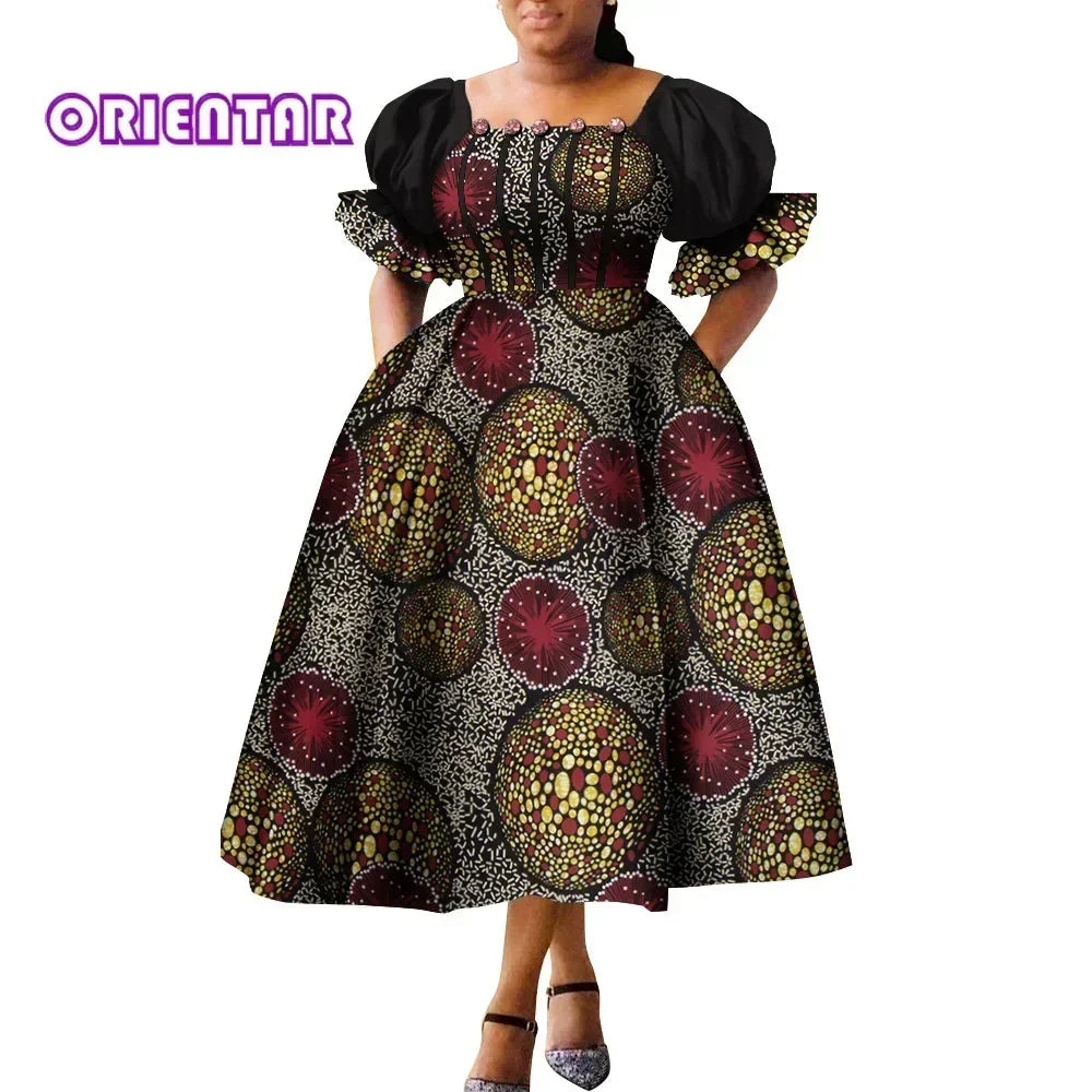 African print Ankara cotton gown with puff sleeves and high waist, stylish design from SHOWLU FASHION STORE.