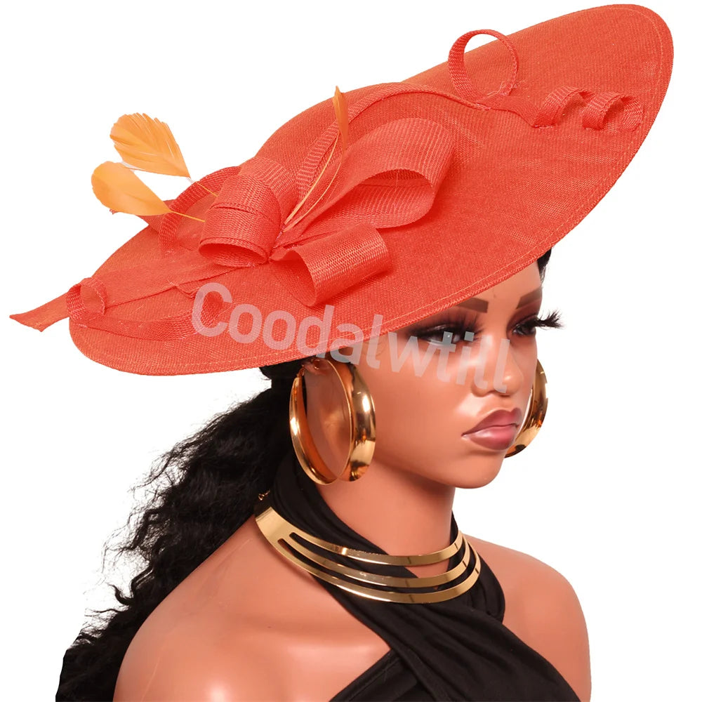 Pink Derby Big Fascinator Hat headband with large decorative bow and feathers, perfect for wedding or race day occasions.