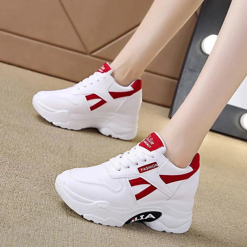 Showlu Fashion women's platform chunky sneakers with PU leather upper, lace-up design, and thick sole for a trendy, bold look.