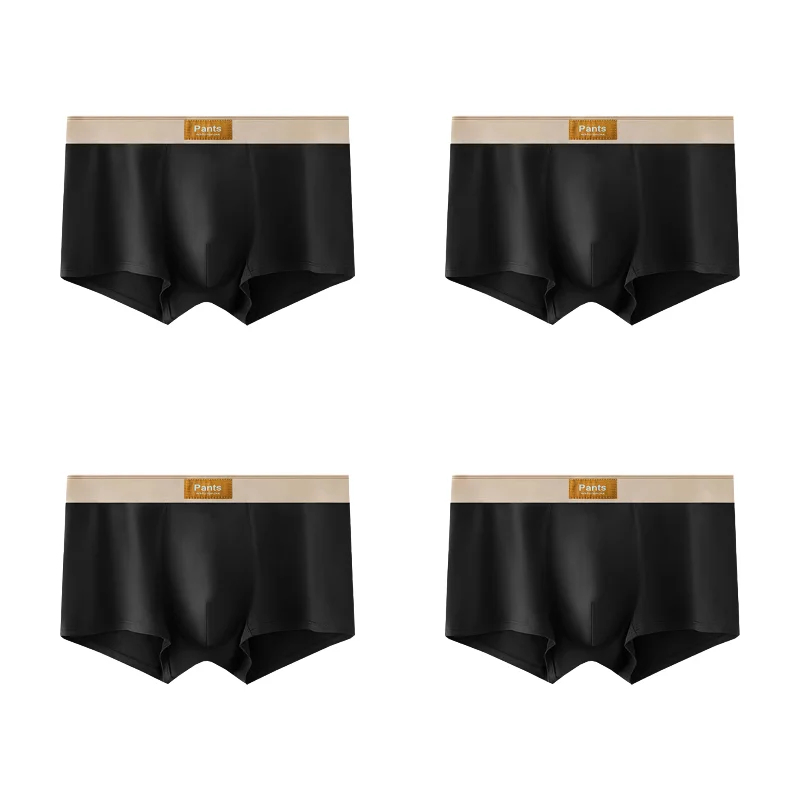 Four pairs of breathable cotton men's boxer shorts in large sizes, Showlu Fashion, featuring comfortable sporty design.