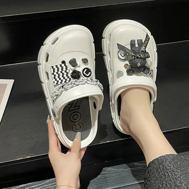 SHOWLU Women's lightweight EVA platform garden clogs, summer beach slides with open toe design and slip-on style.