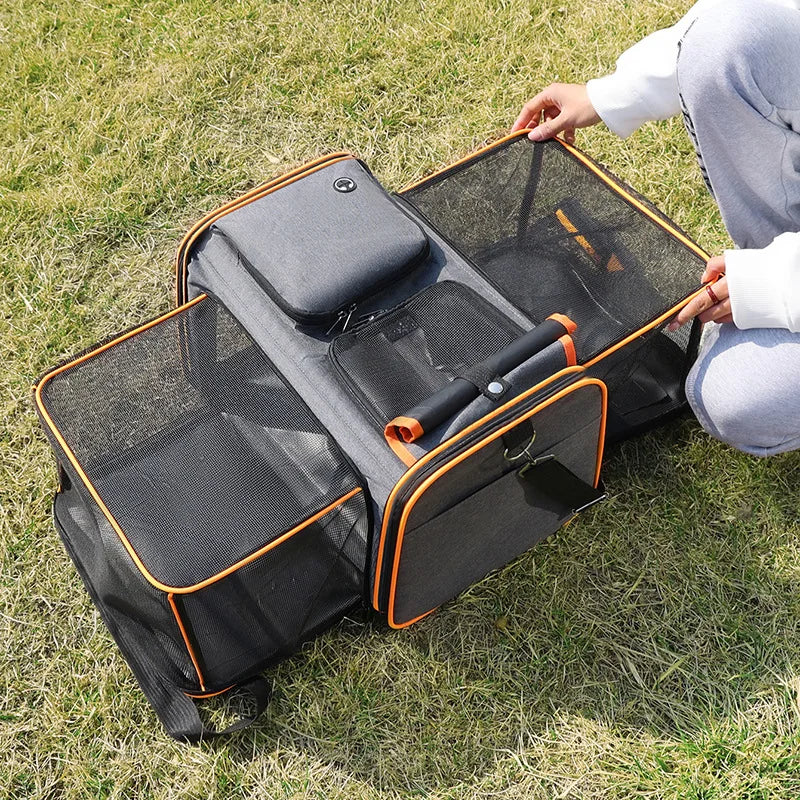 Foldable Showlu Soft-Sided Cat Carrier Bag with handle, portable travel handbag for cats, in black fabric with mesh panels.