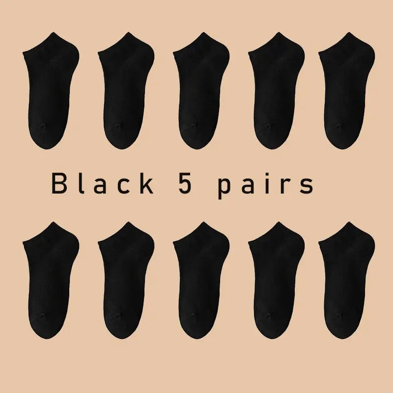 Five pairs of Showlu Fashion Store women's and men's boat socks, low cut, breathable, anti-slip no-show ankle socks in solid colors.