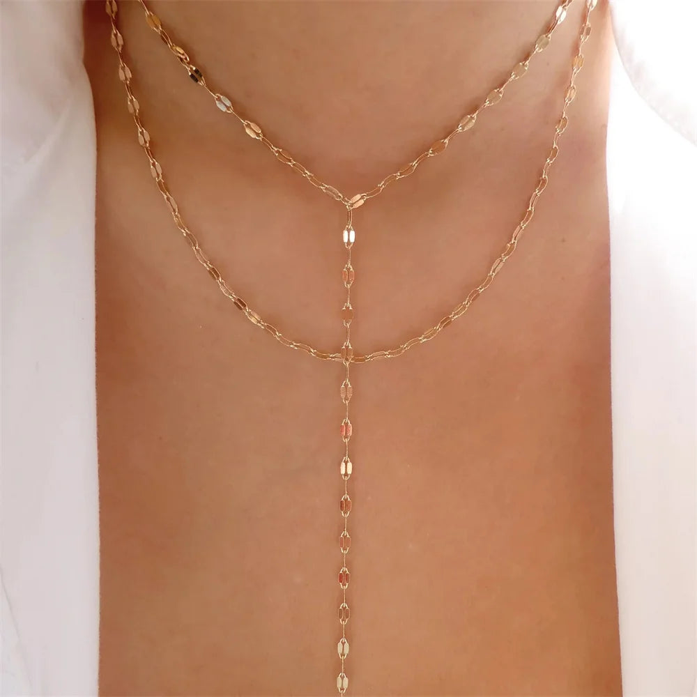 Elegant vintage pearl necklace for women featuring a round pendant, gold multi-layer chain choker jewelry.
