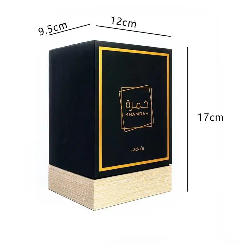 Unisex Lattafa Khamrah perfume spray with warm vanilla and cinnamon scent, 100ml, featuring elegant bottle design.