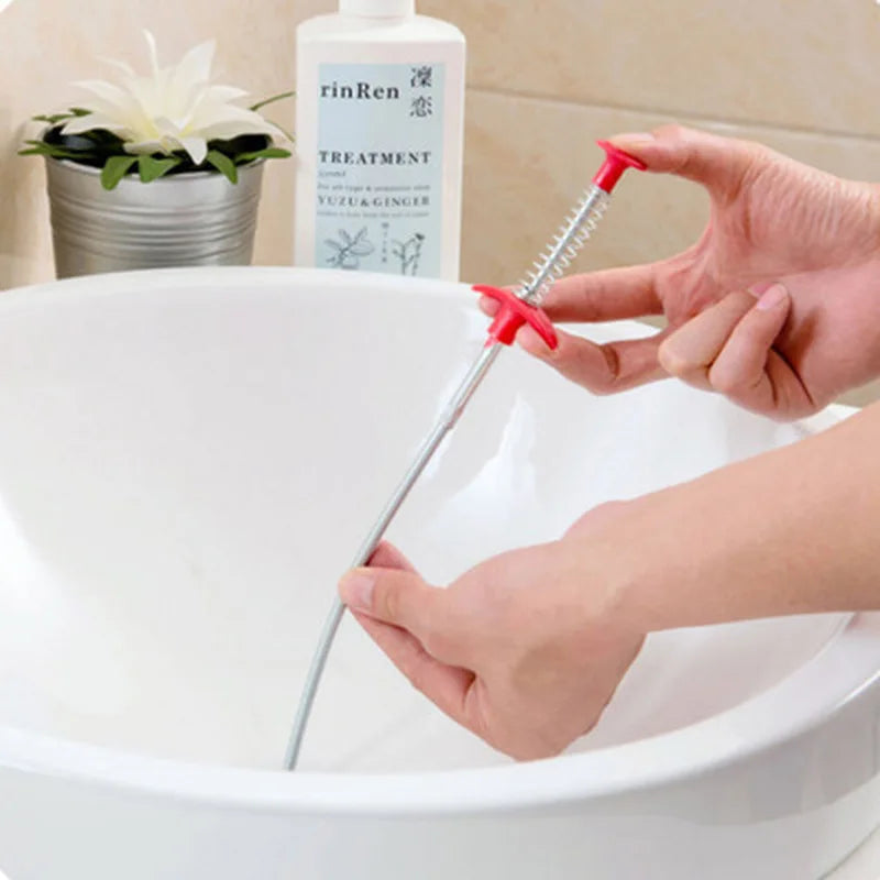 Showlu Smart General drain snake hair remover tool with flexible, coil design for clearing hair clogs in sinks and drains.