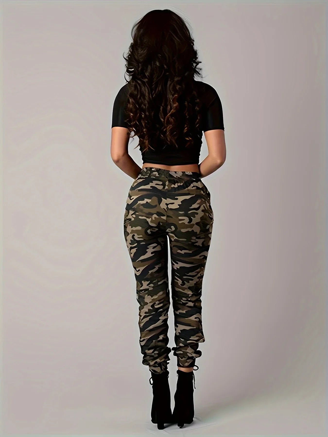 SHOWLU Women's camo print cargo pants with straight leg fit and low waist, stylish military-inspired trousers for casual wear.