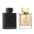 Armaf Club De Nuit 2-piece set featuring woody Eau de Parfum spray in a 105ml bottle, with elegant packaging and design.