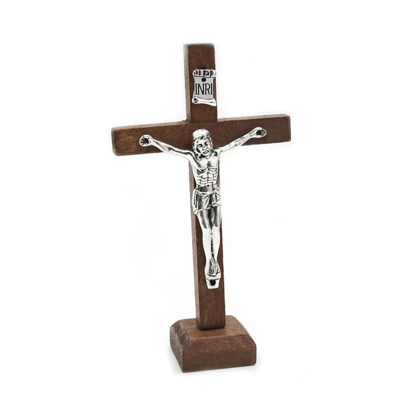 Wooden Catholic Jesus cross with stand, vintage Christian crucifix for church or home tabletop religious decoration.