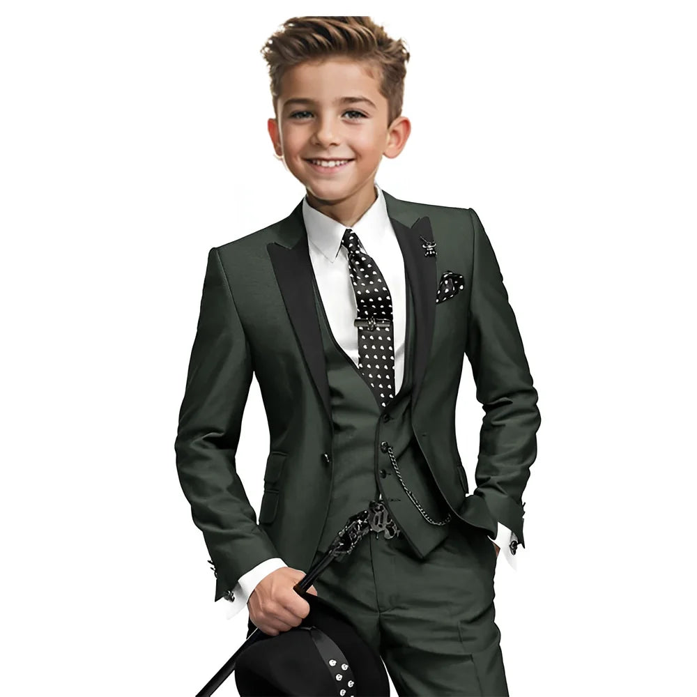 Navy blue boys tuxedo with blazer, pants, and vest from Showlu Fashion, suitable for weddings and formal occasions for ages 2-16.