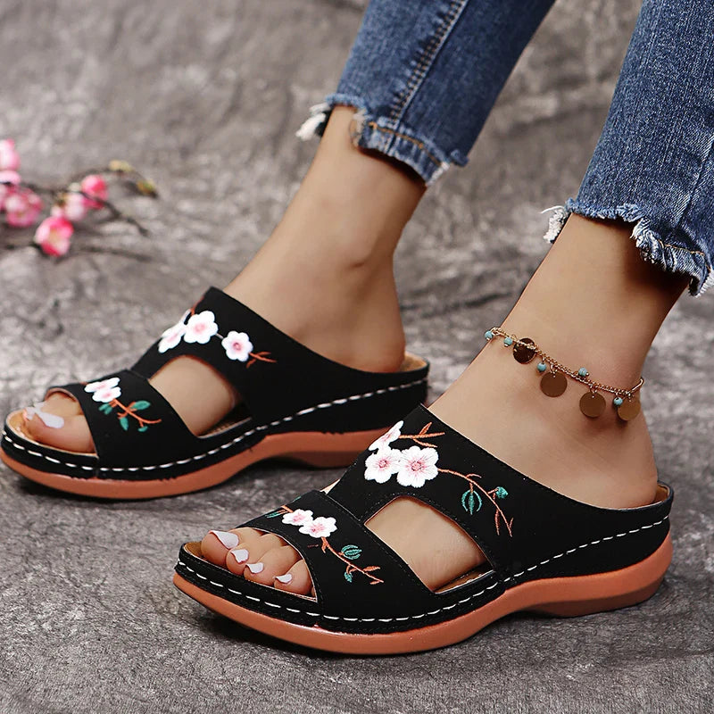 SHOWLU Women's embroidered flower leather wedge sandals with summer-style design and comfortable open-toe style.