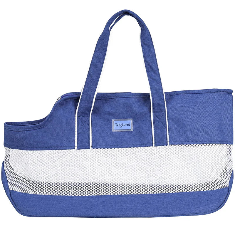Breathable mesh pet carrier by Showlu Fashion Store, foldable canvas shoulder bag designed for cats, with ventilation panels.