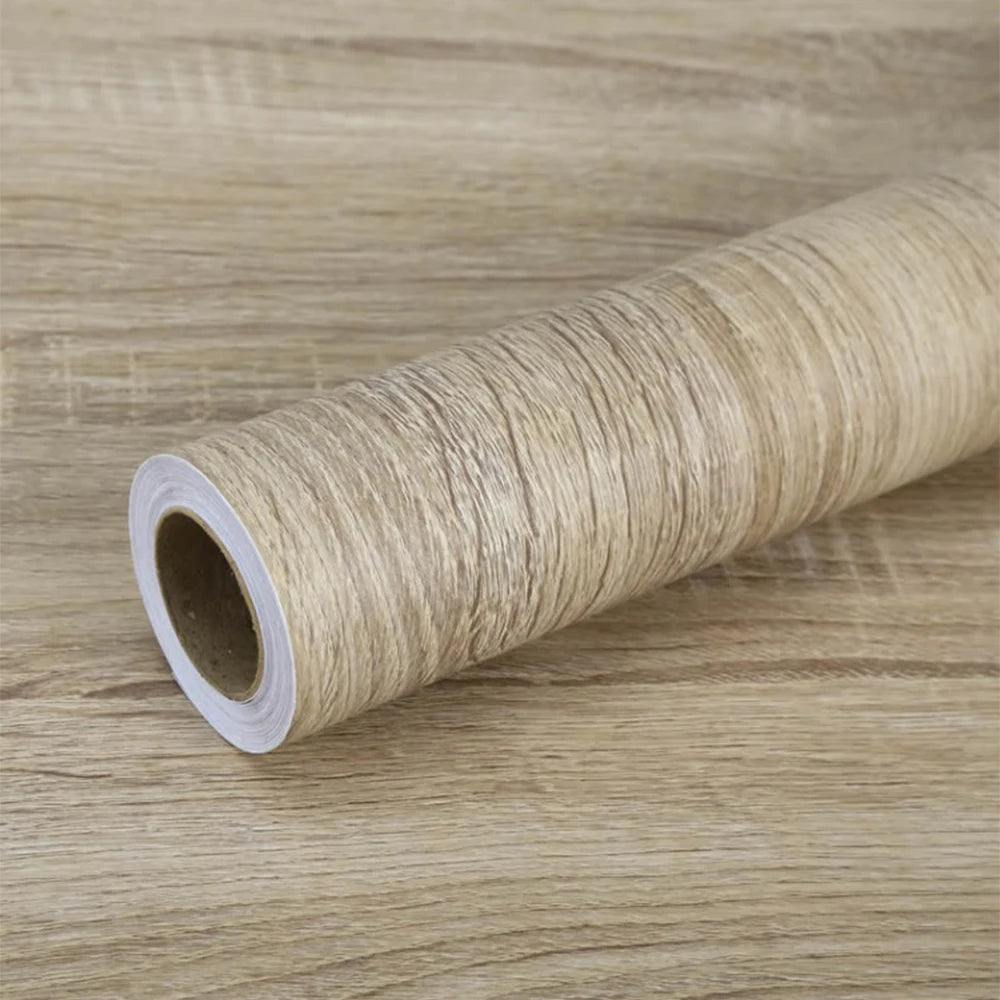 PVC waterproof self-adhesive wallpaper roll with wood grain design for home decor, furniture, and cabinet renovation.