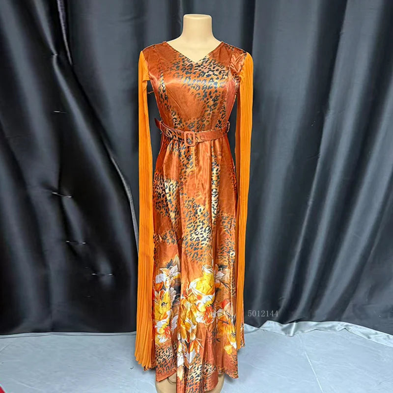 Elegant African women's long dress with Ankara and sequin details, suitable for weddings and parties, by Showlu Fashion.