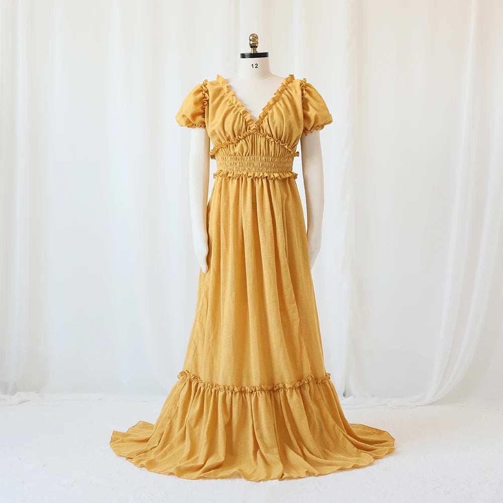 Bohemian off-shoulder maternity maxi gown with ruffled details, perfect for expecting mothers, by Showlu Fashion Store.