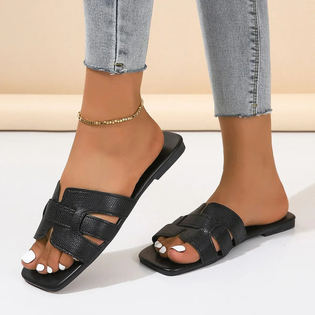 SHOWLU FASHION Women's flat gladiator sandals with multiple straps, casual summer slippers perfect for warm weather wear.
