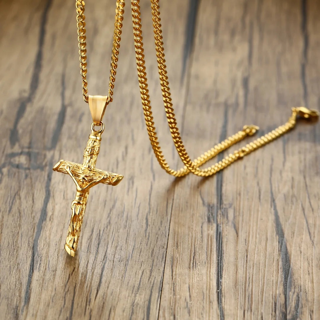 Gold-colored stainless steel cross necklace featuring Jesus pendant, Catholic faith jewelry for men and women.