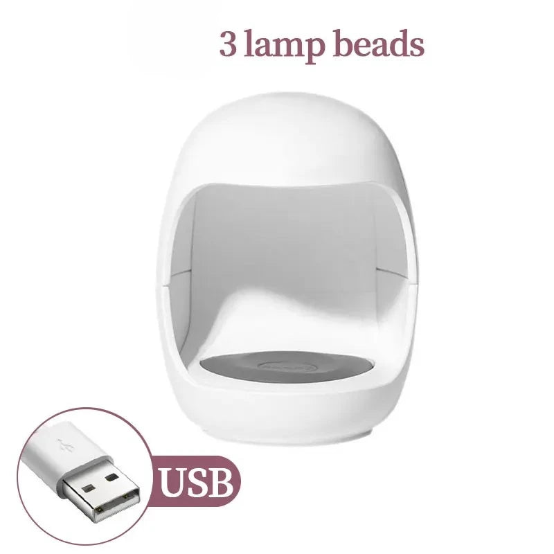 Showlu Smart General LED Nail Dryer Mini, compact portable device for quick and efficient LED curing of gel nails.