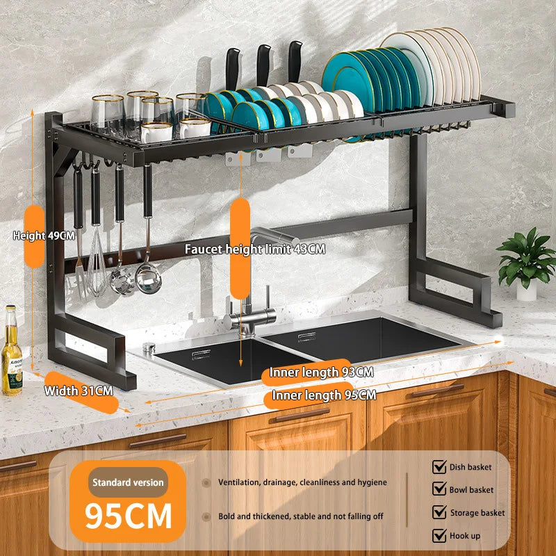 Stainless steel Showlu kitchen sink dish drain rack with utensil holder, organized for drying dishes and utensils.
