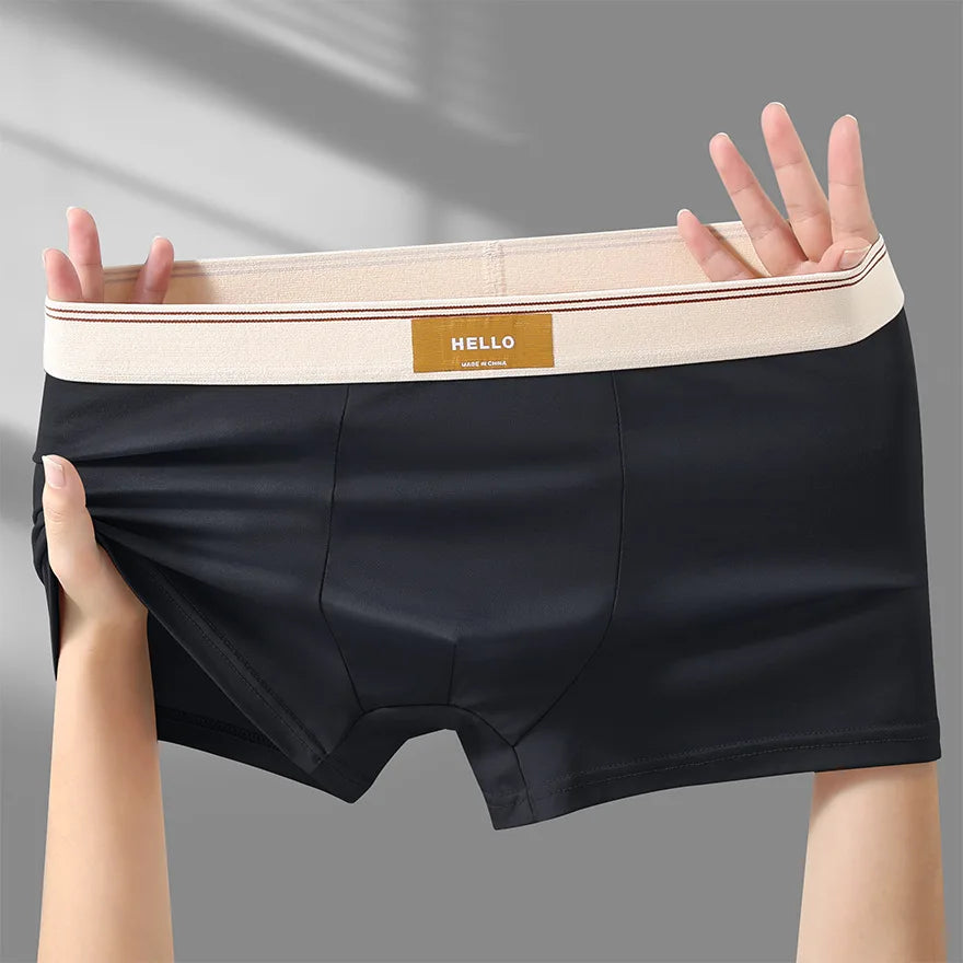 Breathable men's boxer shorts made of milk silk, featuring a comfortable fit and sexy design, from Showlu Fashion Store.