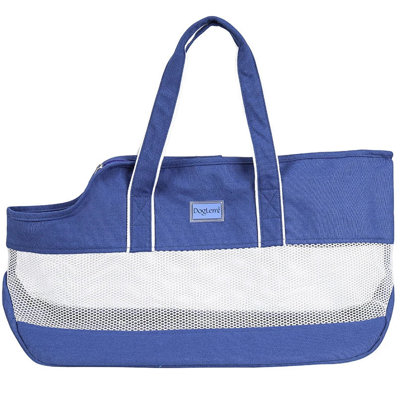 Breathable mesh pet carrier by Showlu Fashion Store, foldable canvas shoulder bag for cats with mesh panels and comfortable straps.