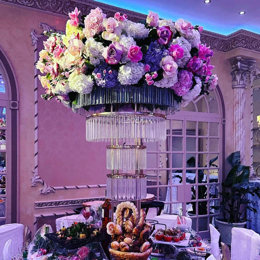 Tall gold crystal wedding centerpiece on a 4-layer metal stand, featuring elegant crystal accents for special occasions.