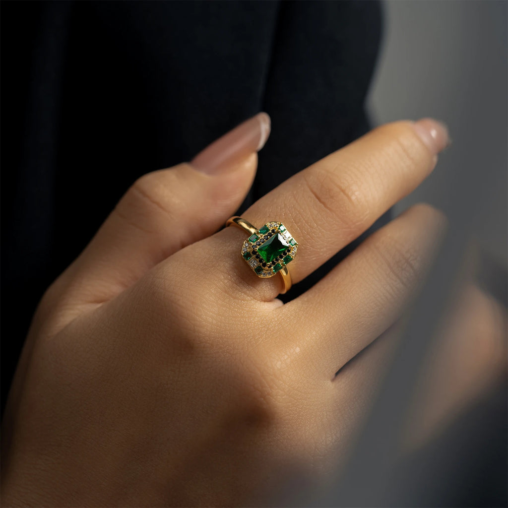 Sterling silver square green zircon ring for women, showcasing a sparkling green gemstone and sleek jewelry design.