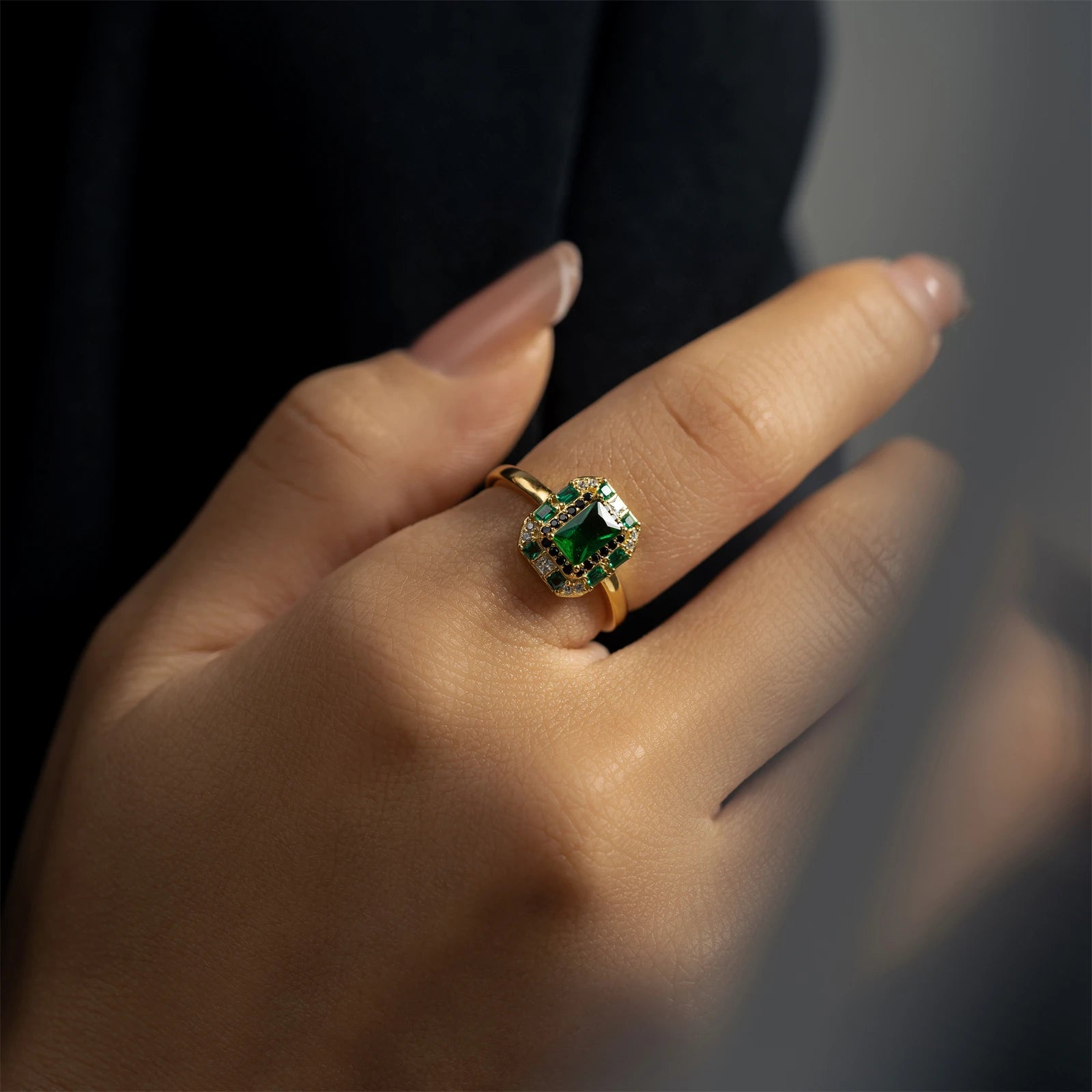 Sterling silver square green zircon ring for women, showcasing a sparkling green gemstone and sleek jewelry design.