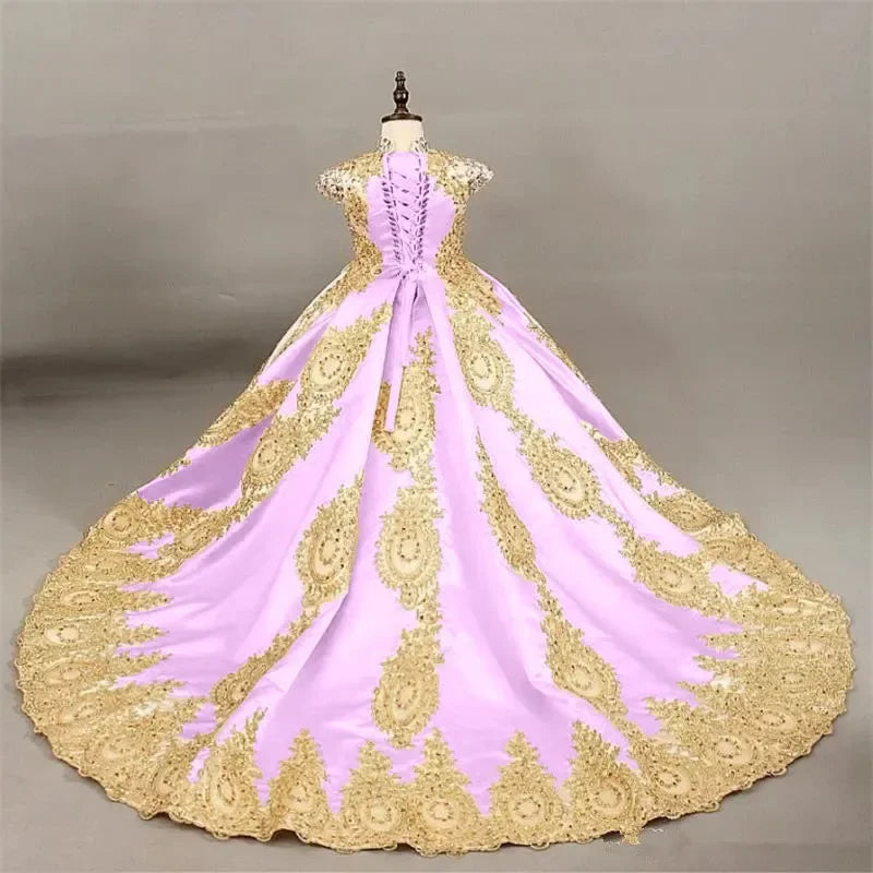 Elegant girls' sleeveless ball gown by Showlu Fashion with gold lace embroidery and a long train, perfect for special occasions.