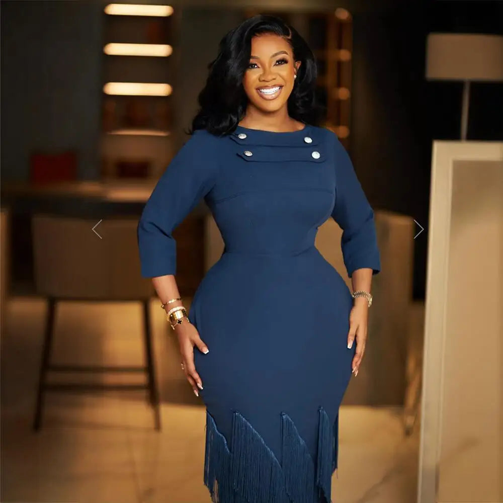 Elegant black evening dress with tassel details and African-inspired design, featuring a fitted silhouette for women’s parties.
