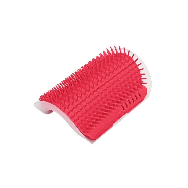 Showlu Fashion Store cat scratcher and massager with grooming brush and hair comb for cats and kittens on grooming table.