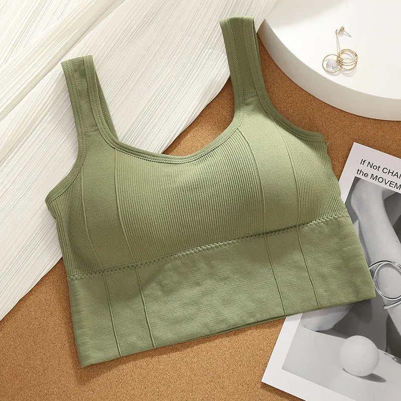 Showlu Fashion breathable women's sports bra with seamless design, anti-sweat fabric, shockproof cups, ideal for yoga and gym workouts.
