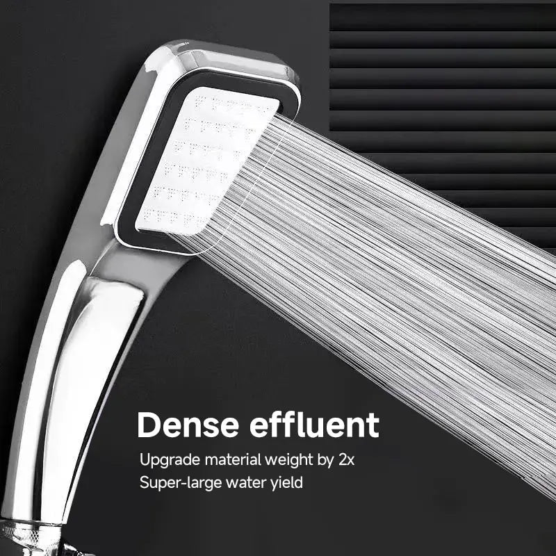 Square handheld showerhead with 300 holes, water-saving rainfall spray, in a modern bathroom setting.
