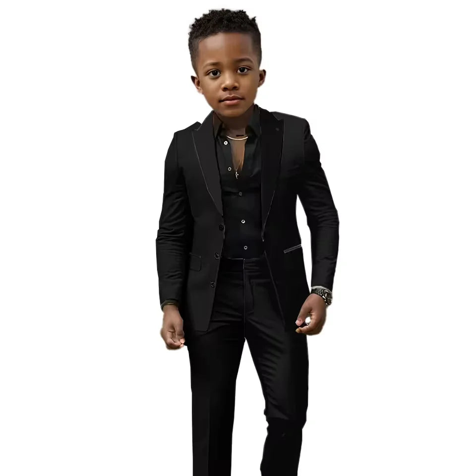 Black and white boys' wedding suit 2-piece tuxedo set with slim fit, featuring jacket and pants for ages 2T-16T.