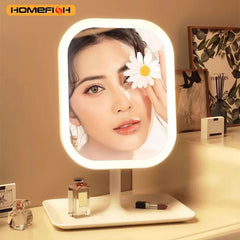 A white LED vanity makeup mirror with a rectangular frame and a storage tray base.