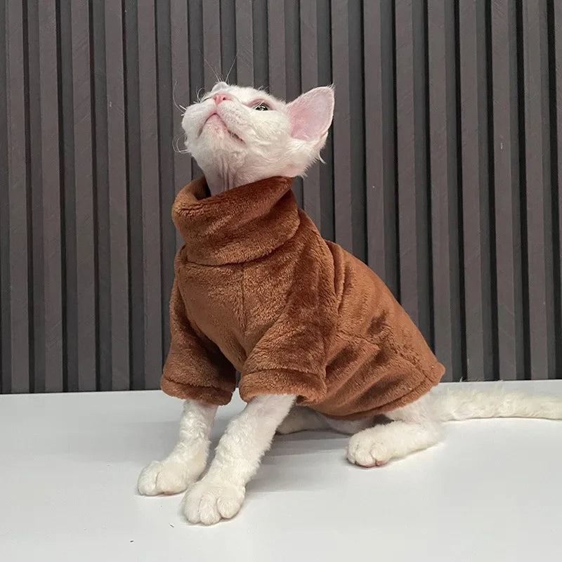 Sphynx cat wearing a white cotton Wang Shan Meow Sphynx Cat Hoodie winter pet jumpsuit, cozy and stylish for cold weather.
