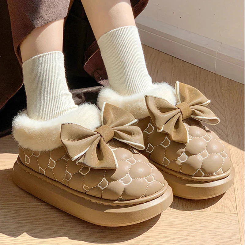 Rimocy Women's Snow Boots by SHOWLU FASHION STORE featuring fluffy butterfly accents and platform ankle design.