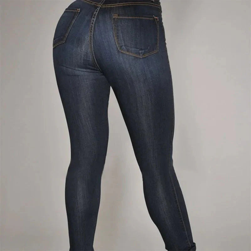 High waist skinny jeans for women in cotton denim, slim fit design by SHOWLU FASHION STORE, shown in black.