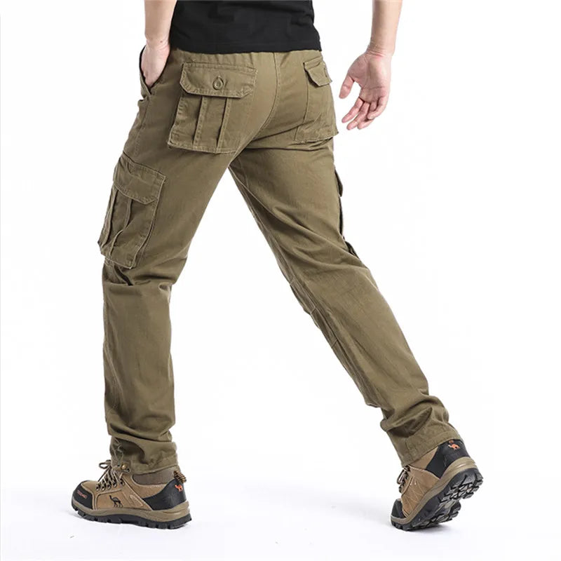 Men's cotton cargo pants in loose fit tactical style, shown as versatile jogging overalls with multiple pockets and comfortable fit.