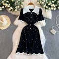 Elegant 2026 summer women's pearl dress by Showlu Smart General featuring a Hepburn style bow collar, short sleeves, and bodycon fit.