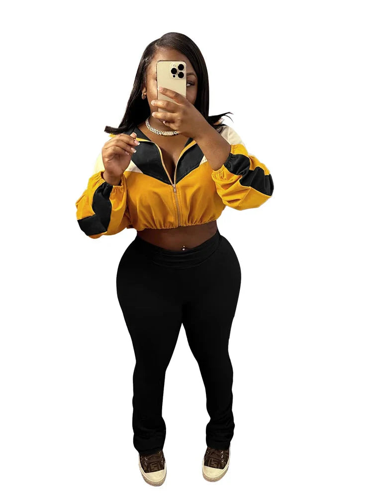 Women's slim fit flare yoga pants and matching crop top tracksuit by JENYAGE, stylish 2-piece athletic wear for active wear.