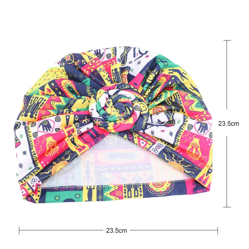 African print pleated turban floral beanie with pre-tied front knot, elastic head wrap, and bandana style headwear for women.